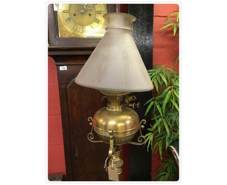 A BRASS STANDARD OIL LAMP, CORINTHIAN COLUMN, BRASS FONT, CONICAL OPAQUE SHADE WITH ETCHED DESIGN (In-house packing unavailab
