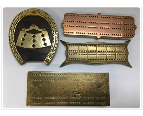 FOUR METAL CRIBBAGE BOARDS ONE IN FORM OF BRASS HORSE SHOE, 19TH CENTURY BRASS WITH CHASED DESIGN OF GENTLEMAN PLAYING CARDS,