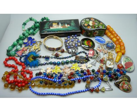 A collection of vintage costume jewellery and two lacquered boxes 