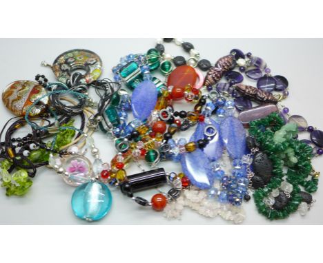 A collection of glass and gemstone jewellery 