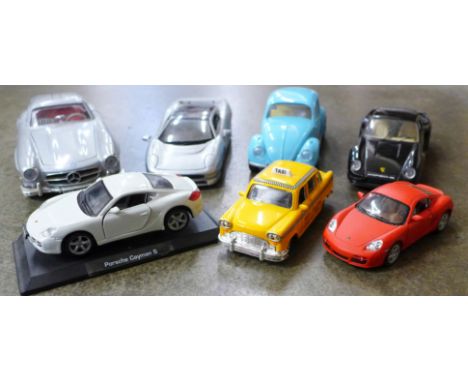 A collection of model cars including Bburago Porsche x2, Mercedes, Kinsmart Porsche and Airfix VW Beetle