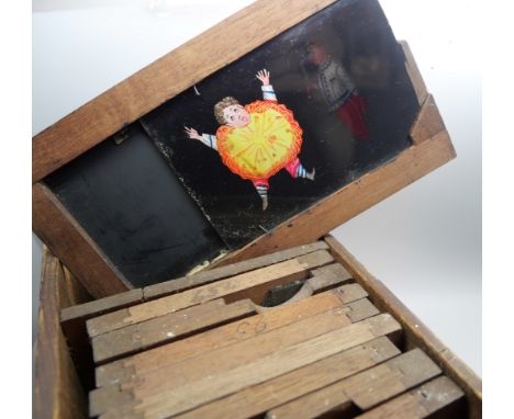 A box of vintage projector slides, some a/f