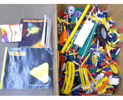 A collection of K-Nex with some instructions 