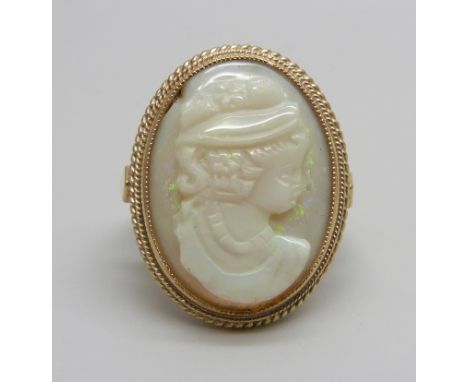 A 9ct gold ring set with an opal cameo, opal a/f (chipped), 5.5g, N