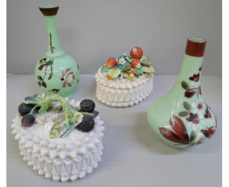 Two ceramic baskets of fruit, both a/f and two opaline green glass vases