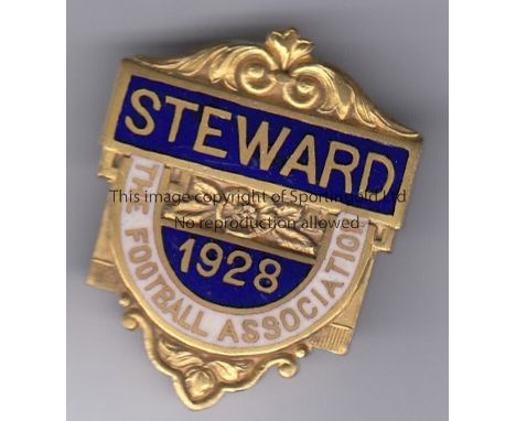1928 FA STEWARD   Official FA Steward badge, 1928, blue , white and gilt, metal and enamel with pin intact.  Good