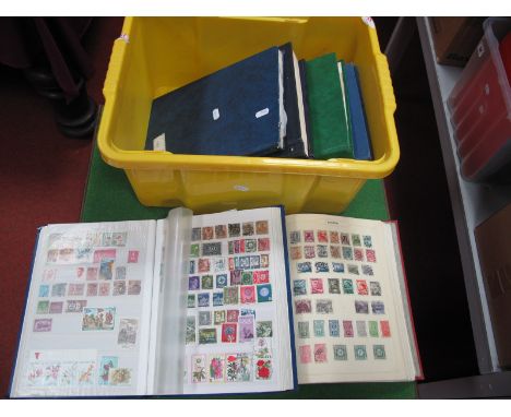 A Carton of Six Stamp Albums and Stockbooks, housing many thousands of mint and used stamps from GB, Commonwealth and Rest of