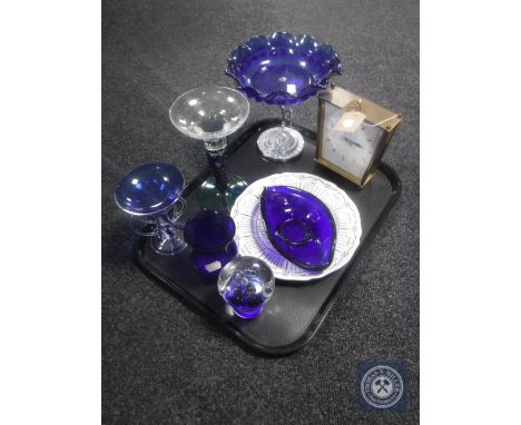 A tray of coloured glass, Ringtons calendar plate together with a brass mantel clock