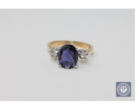 A 9ct gold iolite and diamond ring, size O