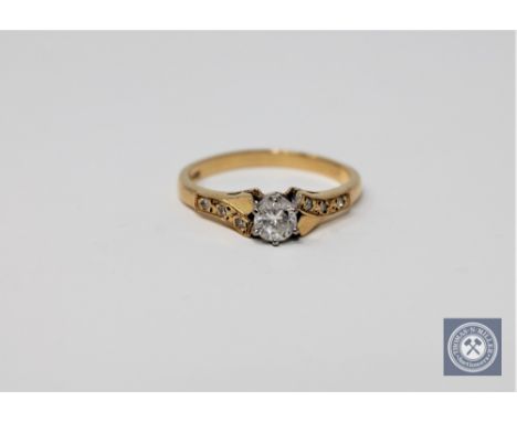 An 18ct gold diamond solitaire ring, approximately 0.40ct.