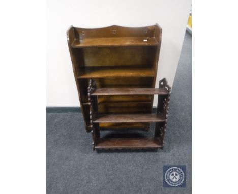 An oak wall shelf together with a set of oak open bookshelves 