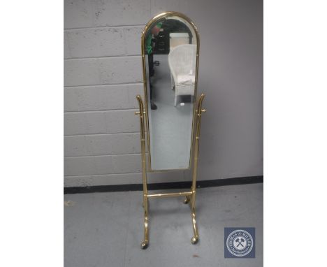 A brass framed cheval mirror
