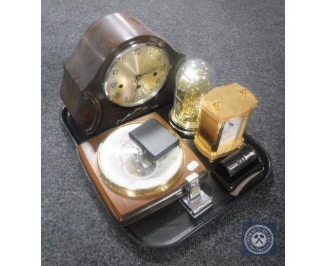 A tray of oak cased mantel clock, Huara clock under shade, brass battery operated carriage clock, two desk calendars and baro