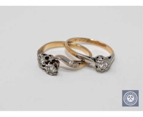 An 18ct gold diamond solitaire ring and an 18ct gold diamond crossover ring
