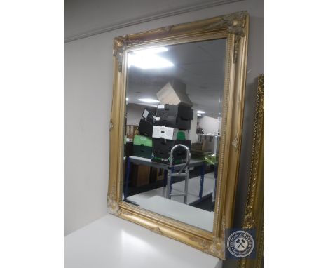 A Victorian style gilt framed bevelled mirror 