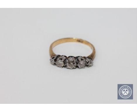 An 18ct gold five stone diamond ring.