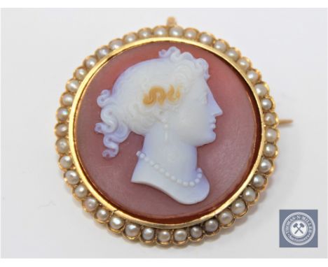 A good quality Victorian stone cameo and pearl brooch, diameter 34 mm. CONDITION REPORT: Cameo stone very slightly loose in i
