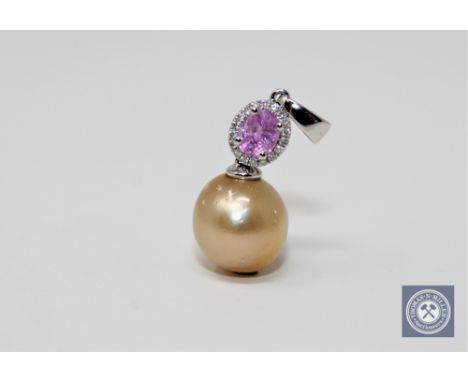 A pearl and pink sapphire pendant, featuring one cultured Tahitian pearl with oval cut pink natural sapphire 0.5ct &amp; 18 r