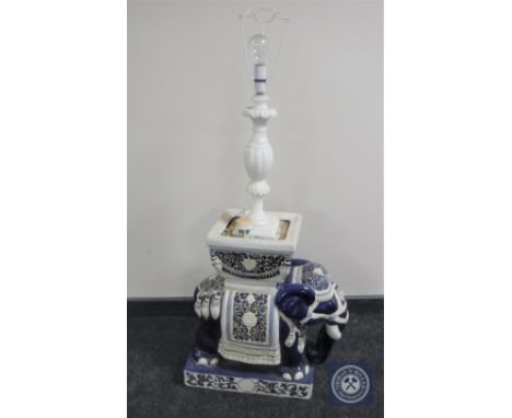 A glazed china elephant plant stand with marble table lamp fitted