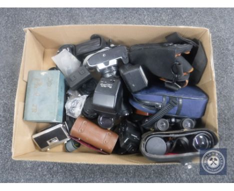 A box of cameras and accessories - Nikon F55 with lens, camera bags, two pairs of binoculars, opera glasses 