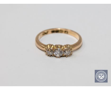 A Victorian 18ct gold diamond three stone ring.