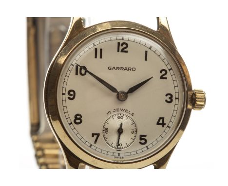 GENTLEMAN'S GARRARD NINE CARAT GOLD MANUAL WIND WRIST WATCH, unsigned 17 jewel movement, the round dial signed Garrard and wi