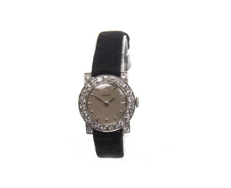 LADY'S OMEGA DIAMOND SET MANUAL WIND COCKTAIL WATCH, movement signed PWC and not Omega, the round dial with applied dot and w