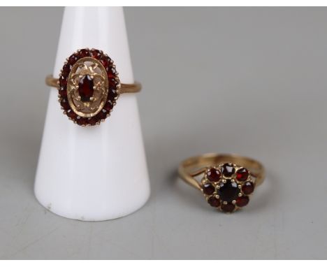 2 gold ruby set rings 