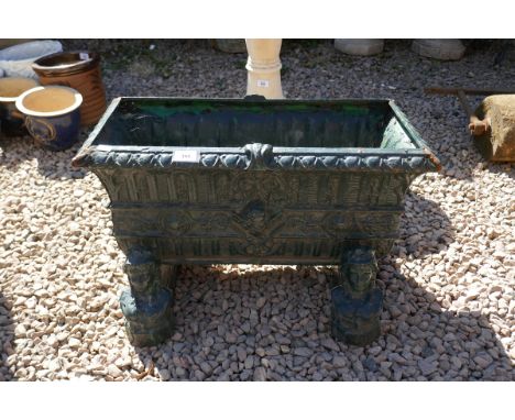 Cast iron trough planter on feet 