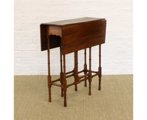 An Edwardian Mahogany Spider-Leg Occasional Table An Edwardian Mahogany Spider-Leg Occasional Table, drop-leaf with gate-leg 