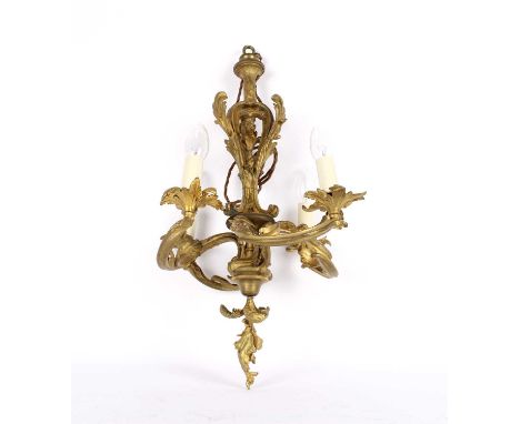 A French Louis XV-Style Rococo Revival Ormolu Chandelier A French Louis XV-Style Rococo Revival Ormolu Chandelier, circa late