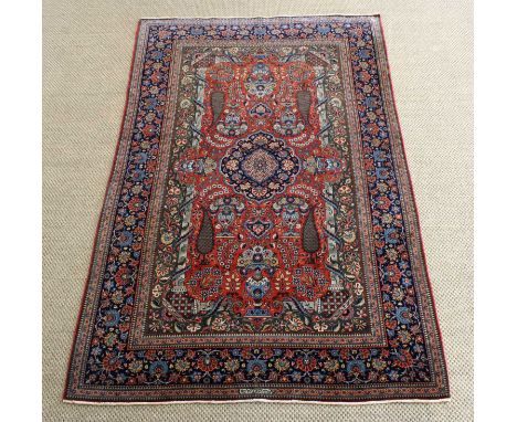A Fine Early 20th Century Kashan Silk Rug A Fine Early 20th Century Kashan Silk Rug, circa 1900-1910, hand-woven with symmetr