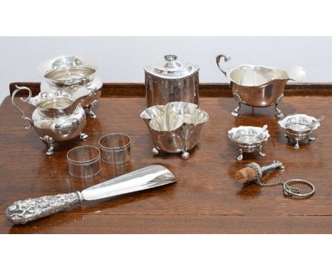 A selection of silver and white metal items. To include a silver tea caddy by Ridley &amp; Hayes, sauce boat, milk jug, salts