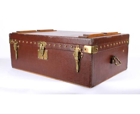 Louis Vuitton, Paris Rare and Early Motoring Trunk Circa 1910, dark tan stitched Vuitonnite exterior with twin brass loop han