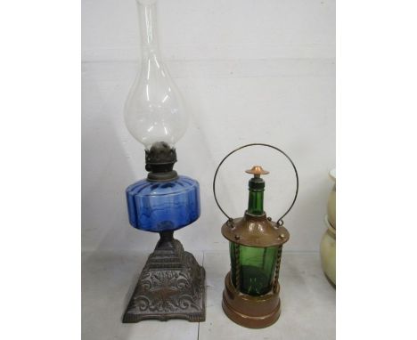 Metal based oil lamp and green glass lamp