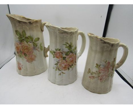 3 graduating vintage floral jugs