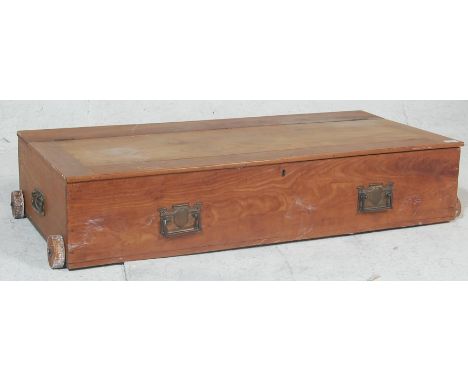 A Victorian &nbsp;19th century&nbsp;under bed storage blanket box converted from a drawer with brass handles, hinged top abov