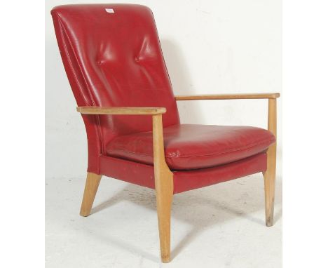 Parker Knoll Furniture - A mid century, circa 1950's Parker Knoll PL988-1126 model armchair. Raised on an angular show wood f
