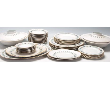 A large late 20th Century fine bone china dinner service by Royal Doulton in the Tapestry pattern comprising of plates, jugs,