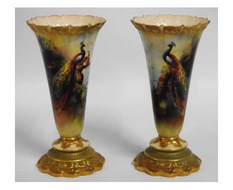 A pair of antique Royal Worcester gilded hand painted vases depicting peacock signed by F. J. Bray, 6.25in tall, very tiny ch