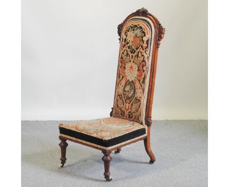 A 19th century prie dieu chair, with tapestry upholstery