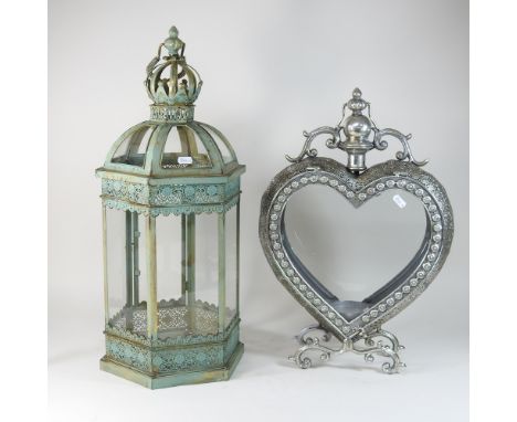 A silver painted metal lantern in the form of a heart, 53cm high, together with a green painted octagonal hanging lantern