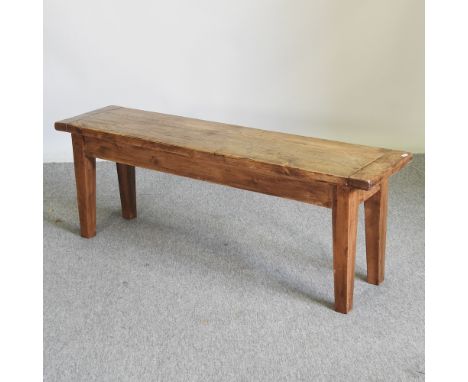 A rustic pine bench, 135cm