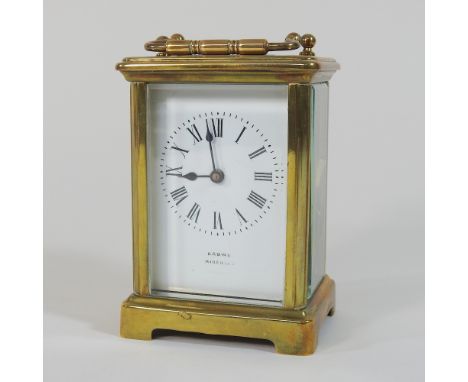 A 20th century brass cased carriage clock, 15cm high overall