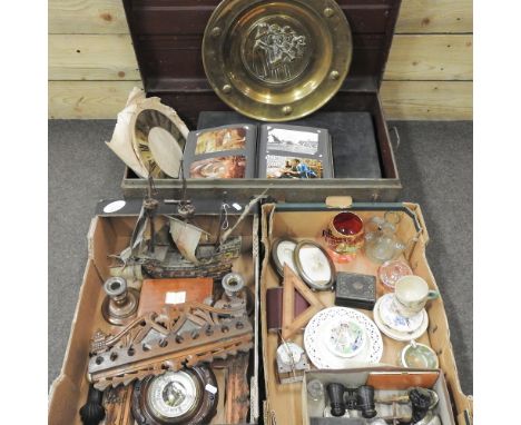 A metal trunk, containing various items to include a postcard album, together with two boxes of other items