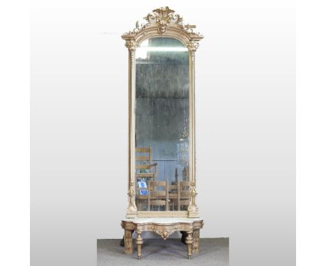 An ornate 20th century continental gilt mounted serpentine console table, with a shaped marble top, with pier mirror, 272 x 8