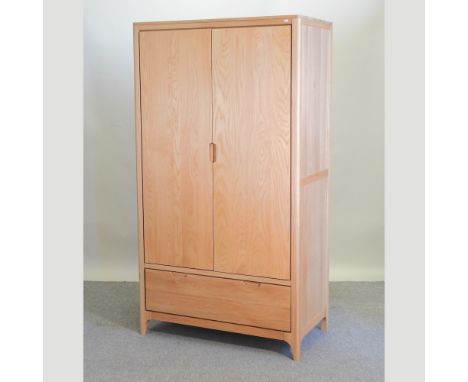 A modern light oak double wardrobe, 110cm