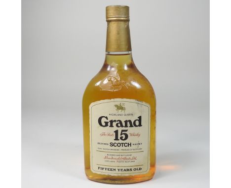 A bottle of vintage Highland Queen Grand 15 scotch whisky