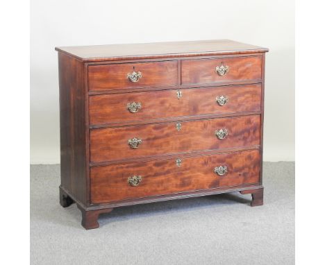 A George III mahogany chest of drawers, on bracket feet, 120cm