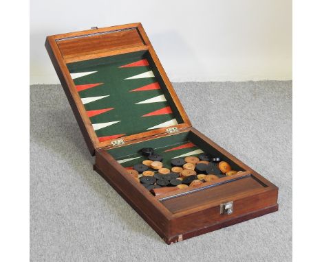 A mid 20th century backgammon set, in a mahogany box, 49cm